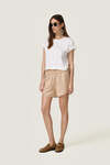 White T-shirt featuring a discreet wire inserted into the hem - SS26
