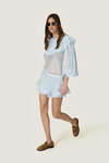 Airy baby blue chiffon blouse with oversized ruffle details - SS26